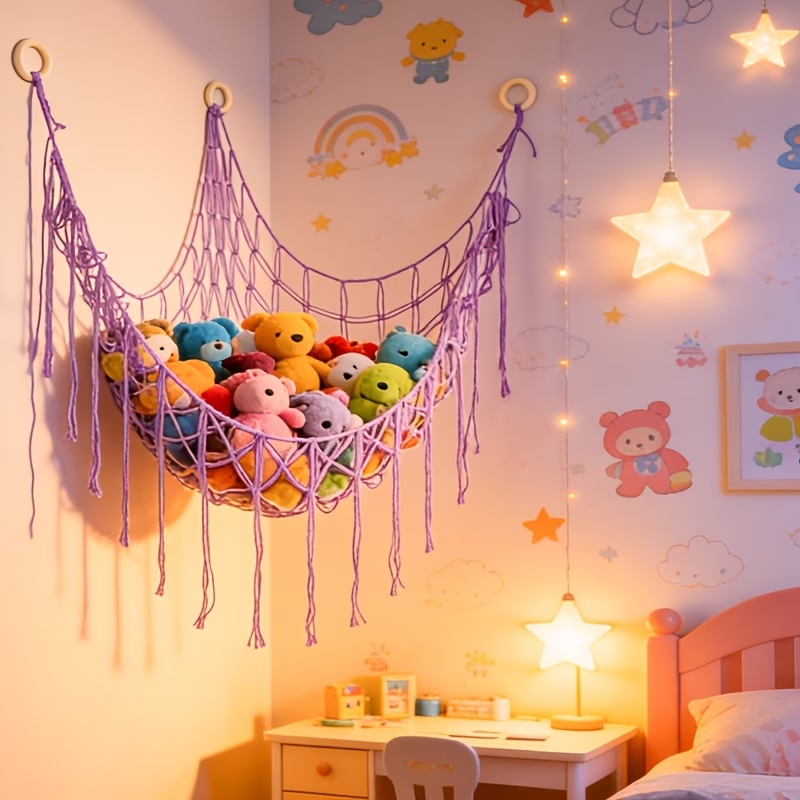 A plush toy storage hammock net with tassels