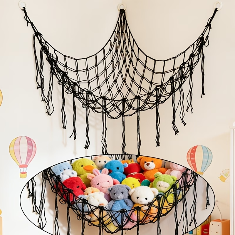A plush toy storage hammock net with tassels