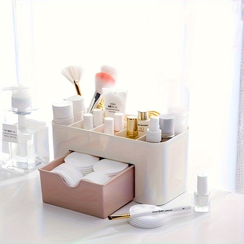 Multi-colored cosmetic storage box with drawers, made of lightweight plastic