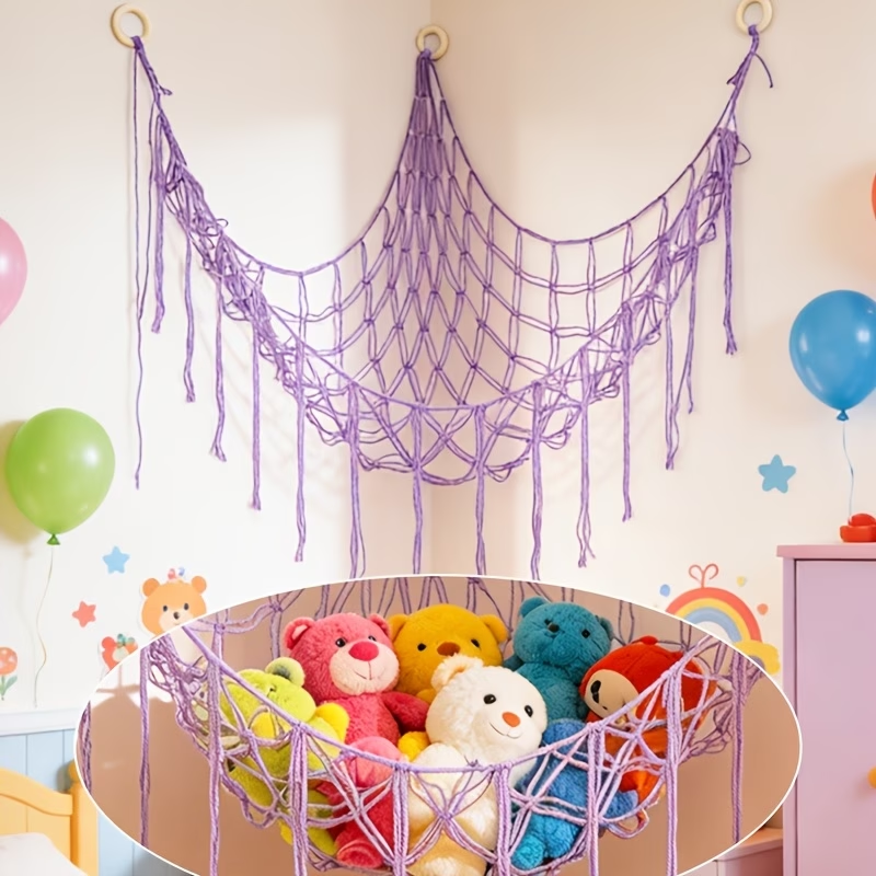 A plush toy storage hammock net with tassels