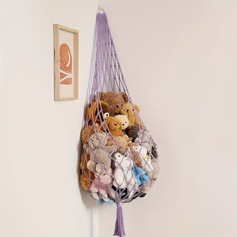 A spacious plush toy storage net, easy to install, with a bohemian design.