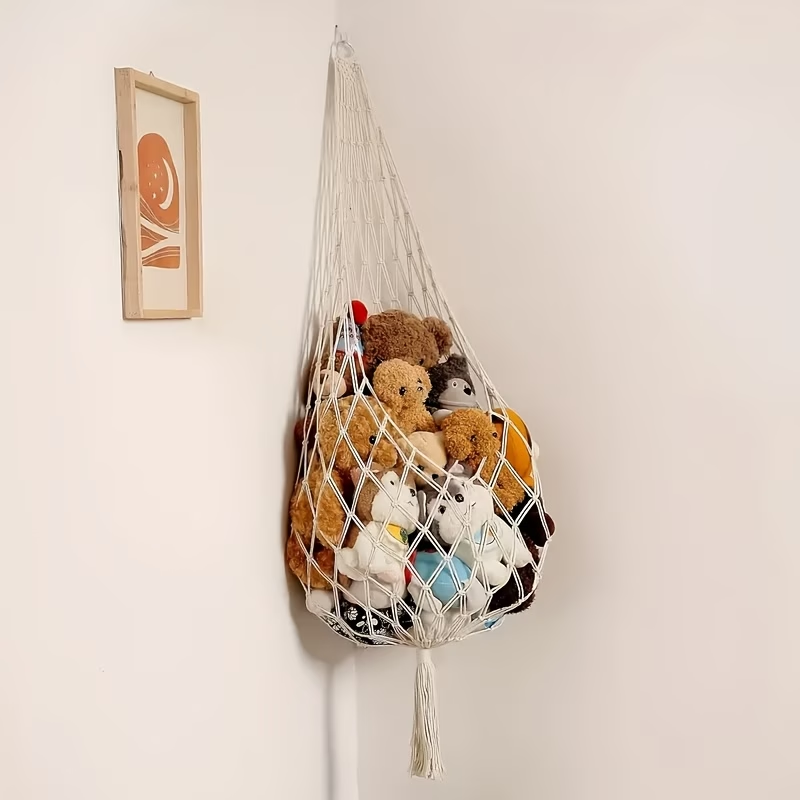 A spacious plush toy storage net, easy to install, with a bohemian design.