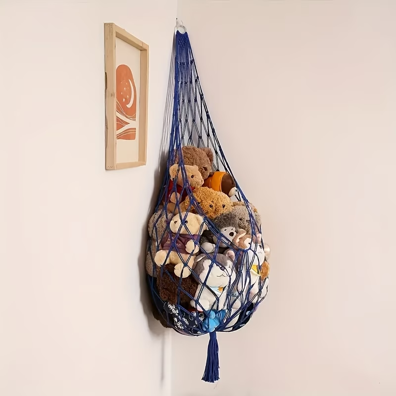 A spacious plush toy storage net, easy to install, with a bohemian design.