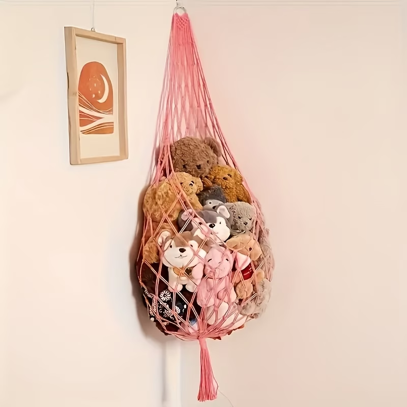 A spacious plush toy storage net, easy to install, with a bohemian design.